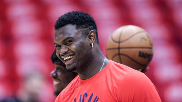 Zion Williamson smiles during warmups.